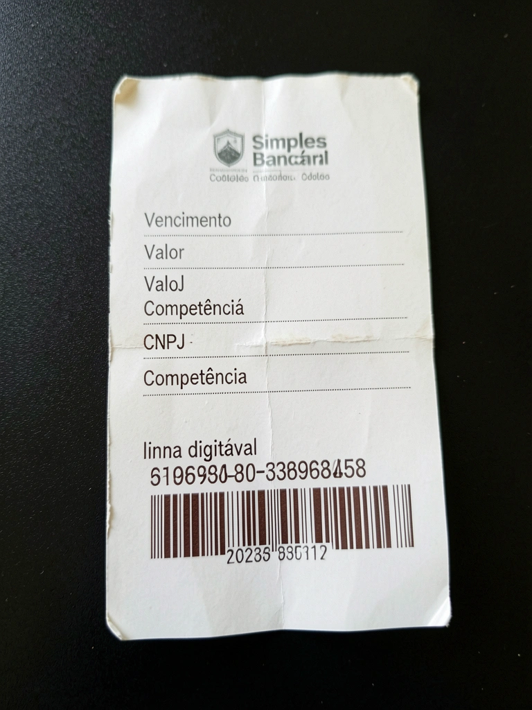 Boleto bancário com logotipo de empresa e linha digitável visível.